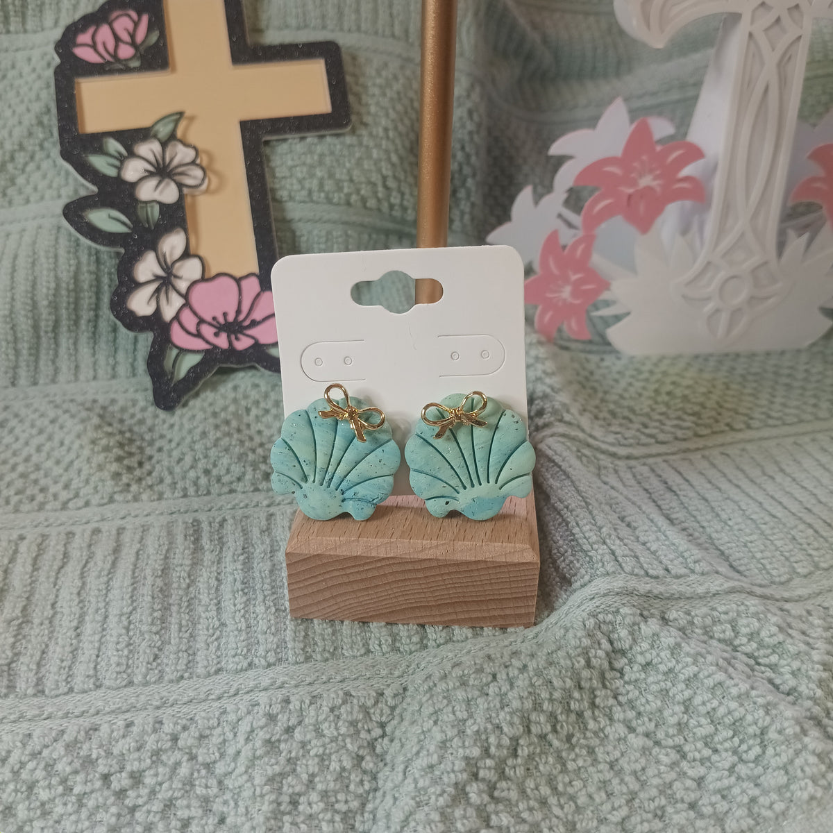 Mint turquoise clay scallop shell stud earrings with gold bow charm