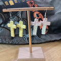 Soft yellow clay cross dangle earrings with embossed Jesus figure