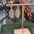 Clay football dangle earrings with gold teardrop crystal stud top