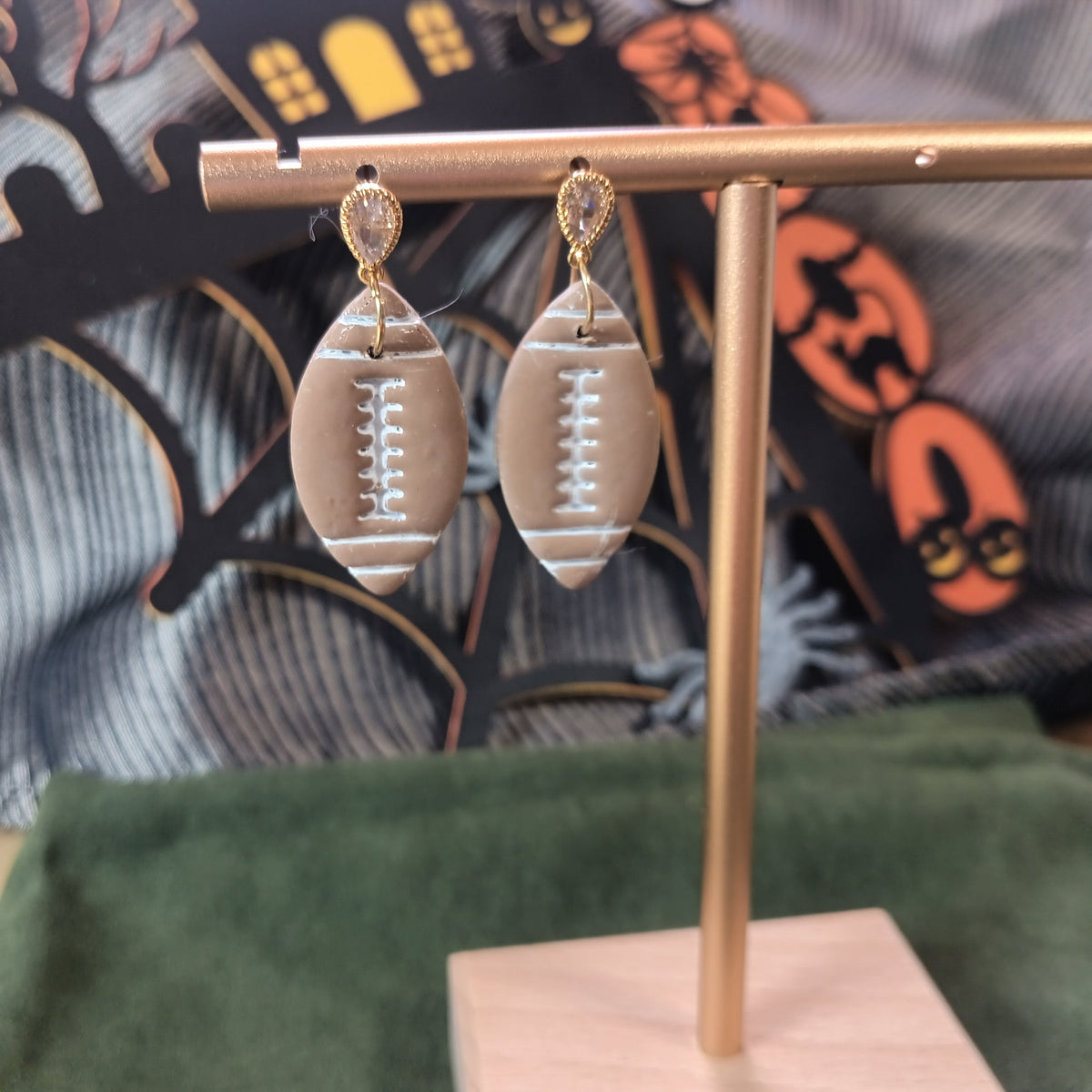 Clay football dangle earrings with gold teardrop crystal stud top