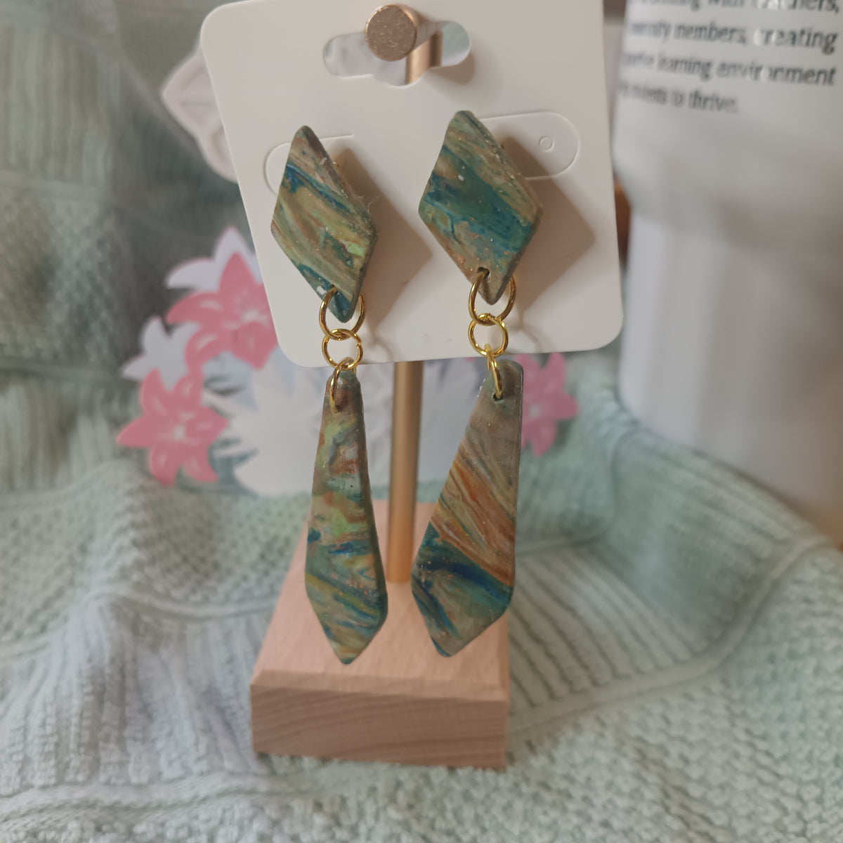 Marbled teal gold and brown two-tier clay dangle earrings with diamond stud top