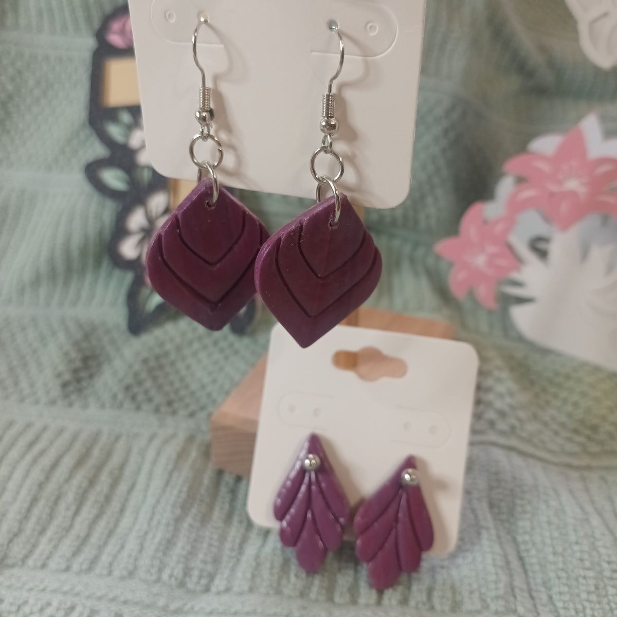 Deep plum layered scale clay drop earrings