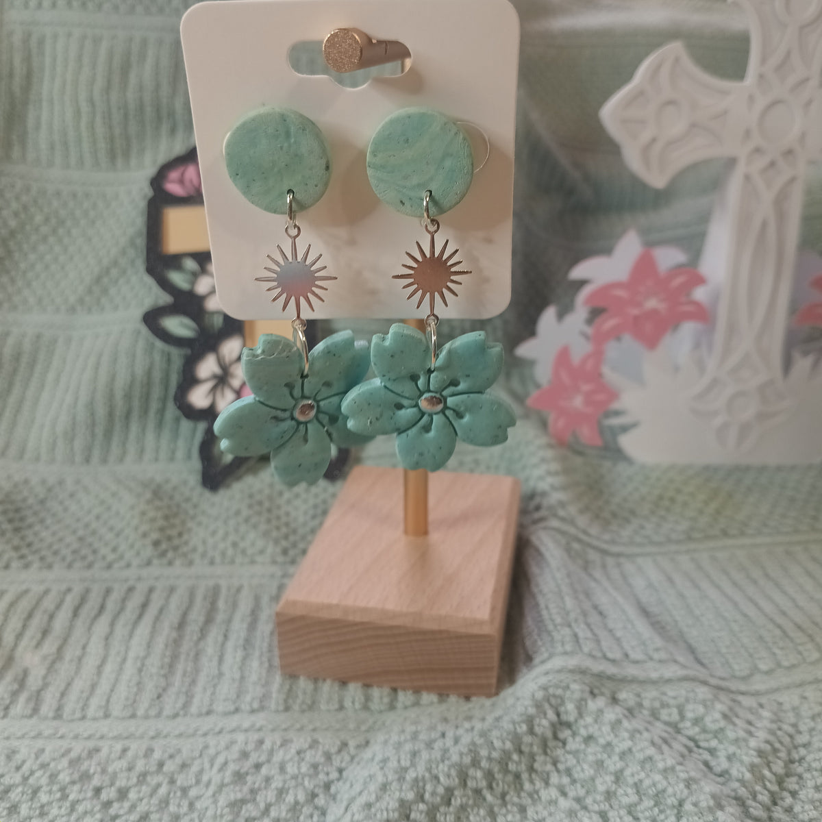 Sage green clay flower and starburst dangle earrings